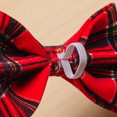 a close up of a bow tie on a table