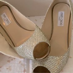 Never Been Warn Shoes, Brand New With Box And Shoe Bag. Picture Of The Heel Has Been Added. Luxury Wedding Shoes With Round Toe, Bag Picture, Cheetah Heels, Jimmy Choo Gold, Designer Wedding Shoes, Jimmy Choo Pumps, Jimmy Choo Heels, Glitter Sandals, Rhinestone Heels