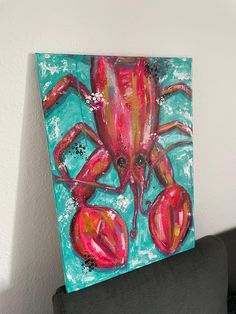 a painting of a red crab on a blue background