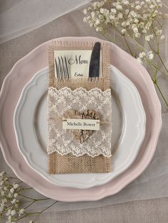 a place setting with lace and napkins