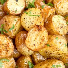 cooked potatoes with herbs and seasoning on top