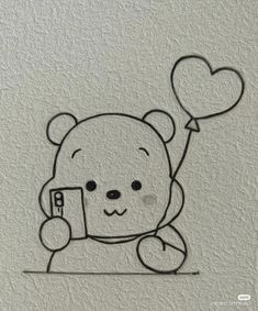 a drawing of a teddy bear holding a cell phone with a heart shaped balloon attached to it