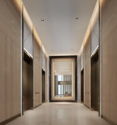 an empty hallway leading to two elevators