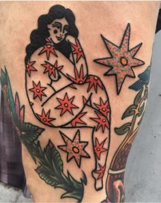 a woman's leg with tattoos on it and stars in the shape of a heart