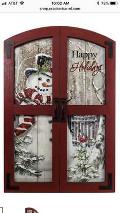 an open red door with snowmen on it and the words happy holidays written in white