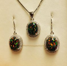 "Black Opal Necklace And Earring Set, Favorite 8x10mm Lab Created Opals With Multicolored Fire, See Video! 8x10mm 925 Sterling Silver Crystal Halo Settings, 18\" Sterling Chain, Ear Wires. Gift Box Included." Fire Opal Green Necklace, Black Opal Earrings, Black Opal Necklace, Black Opal Jewelry, Opal Jewelry Set, Faberge Jewelry, Fire Opal Earrings, Pretty Accessories, Future Wardrobe