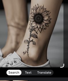 a woman's foot with a sunflower tattoo on the left side of her leg