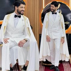 two men in white tuxedos with gold trims