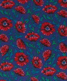 an image of red flowers on blue background