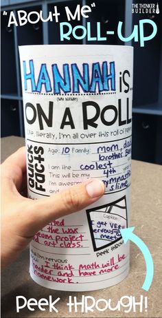 a hand holding up a roll of paper with the words hannah is on a roll