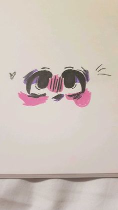 a cat's eyes are drawn in pink and black ink on a white paper