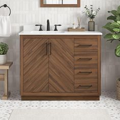 a bathroom with a sink, mirror and wooden cabinet