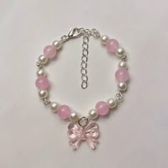 DM to buy 💌 instagram: beamijewelry Original design <3 Cute Charm Bracelets Diy, How To Make Bow With Beads, Bow Charm Bracelet, Cute Pink Bracelets, Pulseras Coquette, Bracelet Inspo Beads, Coquette Bracelets, Coquette Bracelet