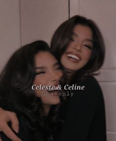 two women hugging each other in front of a white wall with the words celesite and cline on it