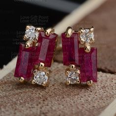 Baguette Ruby & Round Diamond Stud Earrings / 14K Solid Gold Earrings, Cluster Earrings / Handmade Geometric Shape Stud Earrings Features * Items Code:- SGT00295 * 18K also available - Additional fees may apply) * More options in gold color: Rose, yellow, White gold * Metal: Solid 14K Yellow Gold with stamped * Diamonds weight: 0.08 ct * Diamond Color: G-H * Diamond Clarity: SI1 * Diamond Cut: Brilliant (Excellent cut) * Ruby Weight: 0.64 ct.  Measurements: Studs Size: 6 x 4 mm ≫ FAQ below for m Round Diamond Stud Earrings, Diamond Earrings Design, Diamond Earrings Studs Round, Gold Diamond Earrings Studs, Diamond Cluster Earrings, Minimalist Earrings Studs, Jasper Earrings, Minimalist Studs, Solid Gold Earrings