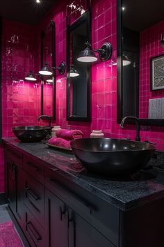 a black bowl sink sitting on top of a counter in front of two pink tiled walls