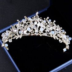 a tiara is sitting on a velvet box