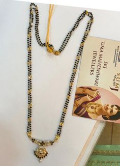 Long Blackbeads Gold, Short Black Beads Designs Gold, Nallapusalu Long Chain Designs, Long Nallapusalu Designs Gold, Long Black Beads Mangalsutra Designs, Nallapusalu Designs Gold Long, Long Mangalsutra, Gold Temple Jewellery