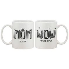 two white coffee mugs with the words mom and dad written in black on them