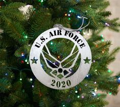 an ornament hanging on a christmas tree that reads, u s air force