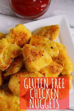 gluten free chicken nuggets on a white plate with ketchup