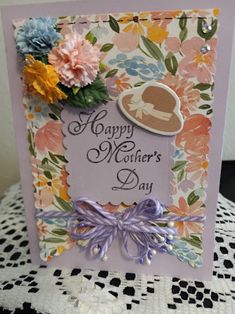 a mother's day card with flowers on it