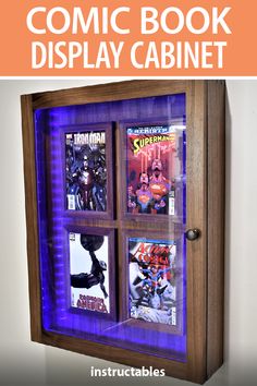 a book display cabinet with comic books in it and text overlay reading the comic book display cabinet