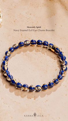 Our meaningful "Heavenly Spirit - Navy Enamel Evil Eye Charm Bracelet" will help you stay more resistant to external ill-will by keeping your energy and vibration high. The mighty Evil Eye symbol allows you to look at the world with optimism and grace. Evil Eye Symbol: deflect negativity. 6 mm Navy Enamel Beads. 1 mm CZ Crystals. 18K Gold Plated Brass Bracelet. Size: 6.5" stretch. Culture: handmade in Bangkok, Thailand. Evil Eye Symbol, Eye Symbol, Enamel Beads, Brass Bracelet, Evil Eye Charm, Bangkok Thailand, The Mighty, Boho Jewelry, Evil Eye