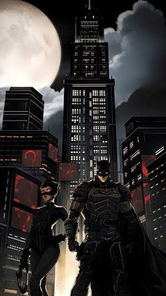 batman and catwoman standing in front of a city at night with the moon behind them