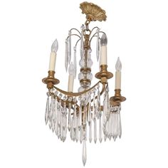 an antique chandelier with crystal drops