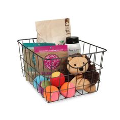 a basket filled with lots of toys and books