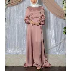 A sophisticated and elegant Shiny Satin Knot Tye Maxi Dress, catered to ensure full coverage. It has a unique design with two tie belts at the front which allows you to style the dress as you wish. A round neck, long cuff sleeves, and a maxi length. Muslim Long Dress, Satin Long Dress, Turkish Dress, Tie Maxi Dress, Satin Dress Long, Dress Muslim, Islamic Dress, Dress Women Elegant, Muslim Dress