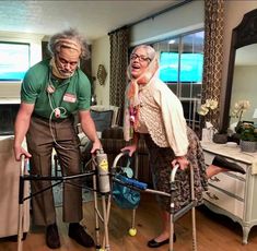 two elderly women with walkers in a living room