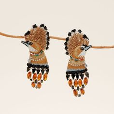 Gold, Black, and Multi Colored Crystal and Bead Bird Earrings Staged on Branch with Tan Background Bird Earrings Gold, Mignonne Gavigan, Delicate Necklaces, Embroidered Bird, Scarf Necklace, Statement Earring, Bird Earrings, Virtual Fashion, Gift Card Shop