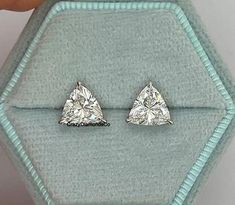 Elegant Trillion Cut Stud Earrings, Luxurious 7.5MM Trillion Cut Colorless Moissanite Diamond Earrings, Claw Prong Wedding Earring, 10k Gold ✹✹𝐖𝐞𝐥𝐜𝐨𝐦𝐞 𝐭𝐨 𝐂𝐫𝐚𝐳𝐲𝐃𝐢𝐚𝐦𝐨𝐧𝐝𝐬𝐂𝐨✹✹ Detail about stones Moissanite & Simulated Stone: ----------------------------- Stone Shape: Trilliant Cut Stone Size: 7.50 mm Weight: 2.42 TCW Color: Colorless Cut: Excellent Clarity: VVS ★ 𝑰𝒕𝒆𝒎 𝑫𝒆𝒕𝒂𝒊𝒍𝒔:- ☛ Metal Purity: Solid Gold (10KT, 14KT, 18KT); Silver(925 Sterling, 935 Argentium), 950 Platinum ☛ Metal Tone: Yellow, White, Rose ☛ Stamp/Hallmark: Yes ★ 𝑪𝒖𝒔𝒕𝒐𝒎𝒊𝒛𝒂𝒕𝒊𝒐𝒏:- ☛ Customized Design Jewelry. ☛ All cuts which you dream to make with moissanite. ☛ Updating every step of your ordered jewelry(Loose Stone, CAD & Making Process) ☛ All listed items in our stores are made Gia Certified Trillion Cut White Gold Jewelry, Wedding Earrings With Lab Grown Diamonds, Vvs Clarity Pear-shaped Diamond Earrings For Wedding, Trillion Cut Formal Earrings, Wedding Vvs Clarity Diamond Earrings, Gia Certified Trillion Cut Jewelry Gift, Gia Certified Diamond Bridal Earrings For Wedding, Gia Certified Heart Cut Jewelry For Wedding, Gia Certified Round Bridal Earrings For Wedding