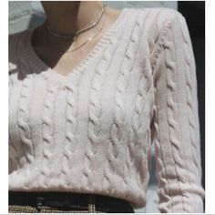 Brandy Melville V-Neck Cable Knit Sweater In Light Pink. A Classic V-Neck And Cable Knit Construction Give This Slouchy Sweater A Relaxed, Weekend Vibe. Keep It Easy Going In A Cozy Pullover Sweater. - Cotton Blend - V- Neckline - Long Sleeves - Pullover Style - This Knit Material Offers A Moderate Stretch - One Size (Xs-M In My Opinion) Trendy V-neck Cable Knit Cardigan, Spring Cable Knit V-neck Sweater, Fitted Knitted V-neck Sweater, Pink V-neck Knit Top, Classic V-neck Spring Knit Top, Fitted V-neck Cable Knit Cardigan, Fitted V-neck Knitted Sweater, Cozy Fine Knit V-neck Tops, Chic V-neck Fine Knit Sweater