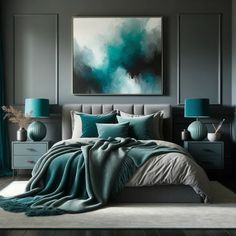 a bedroom with grey walls and teal bedding in the center, artwork on the wall