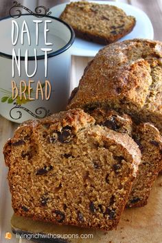 a loaf of date nut bread on a cutting board