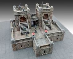 a model of a castle with stairs and turrets