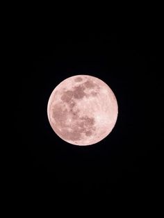 the full moon is seen in the dark sky