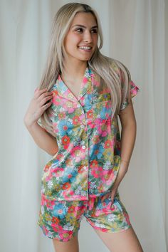 Our Women's Flowerland Satin Pajamas are made from an ultra soft satin blend fabric with a pinch of spandex for unparalleled comfort and flexibility. With the comforting coolness of the material, they are both breathable and airy - comfortable beyond your nightly dreams. Featuring elevated design details like cuff hem sleeves, elastic waist bottoms, shorts with pockets, and contrast piping trim. Add a sentimental touch with our printed personalization option, making these pajamas the perfect gif