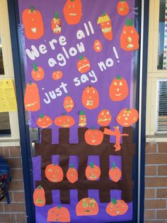 a bulletin board with pumpkins on it that says we're all alright just say no