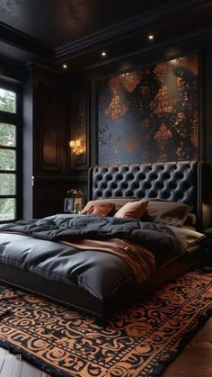 a large bed sitting in the middle of a bedroom next to a wall with paintings on it