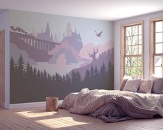 a bedroom with a large mural on the wall and wooden flooring in front of it