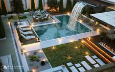 this is an aerial view of a pool and patio area at night with lights on