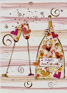 two champagne flutes are next to a bottle with hearts on it