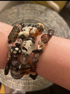 1990s vintage bracelet stack, includes 4 bracelets. One hand painted dog & bone stretchy bracelet. One black and white beaded bracelet featuring a dog bone, The beads are larger and funky the bone isn't perfect but looks very cute. The other 2 bracelets  have  no dogs or bones but feature black polka dot clear rectangle beads. I think the 4 bracelets look great together but wear them separately if you want. Fun style for a dog lover. The bracelets that latch measure about 9 inches and the other about 8 and a half inches. The other bracelet is stretchy. Black And White Beaded Bracelet, Beaded Bracelet Stack, White Beaded Bracelet, Funky Bracelet, Painted Dog, Handmade Beaded Necklaces, Vintage Bracelet, Vintage Dog, Stretchy Bracelets