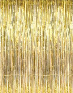 gold tinsel hanging from the ceiling