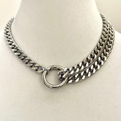 Silver Miami Cuban Chain Necklace is a high quality Cuban/Curb chain.  Chunky and thick. Great weight and sits beautifully around the neck.  The double strand on the one side makes this a very stylish and edgy piece of jewelry. The chain is approximately 9mm wide . The Spring Ring approximately 35mm Material: Rhodium plated brass  Lead safe and nickel free.  This is a very special piece  and a perfect gift for a friend, girlfriend, wife or even just for yourself:) Also available in Gold. Please check out the listing in my shop. Tips to keep your jewelry looking good. 1) Keep jewelry away from water and chemicals. 2) Remove during physical activities. 3) Store separately in a soft pouch or airtight box. 4) Avoid wearing to bed. 5) Gently polish with a soft, lint-free cloth to clean. PACKAGI Clear Sea, Boho Jewels, Cuban Chain Necklace, Sterling Necklace, Friend Girlfriend, Chunky Chain Necklaces, Miami Cuban, Sea Glass Necklace, Cuban Chain