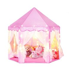 a pink play tent with stuffed animals and lights on the sides, in front of a white background